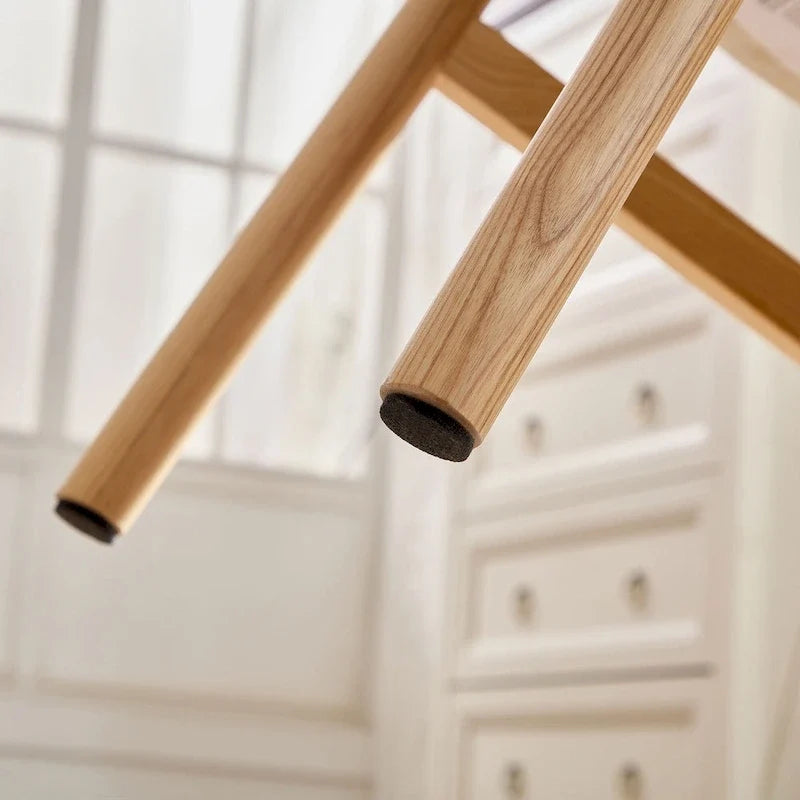 Chaise de salle à manger moderne sans accoudoirs, avec structure en bois et assise rembourrée, adaptée à la cuisine, au salon et au restaurant