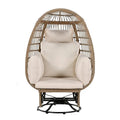 Fauteuil pivotant œuf en rotin pour terrasse, avec coussins et fonction bascule